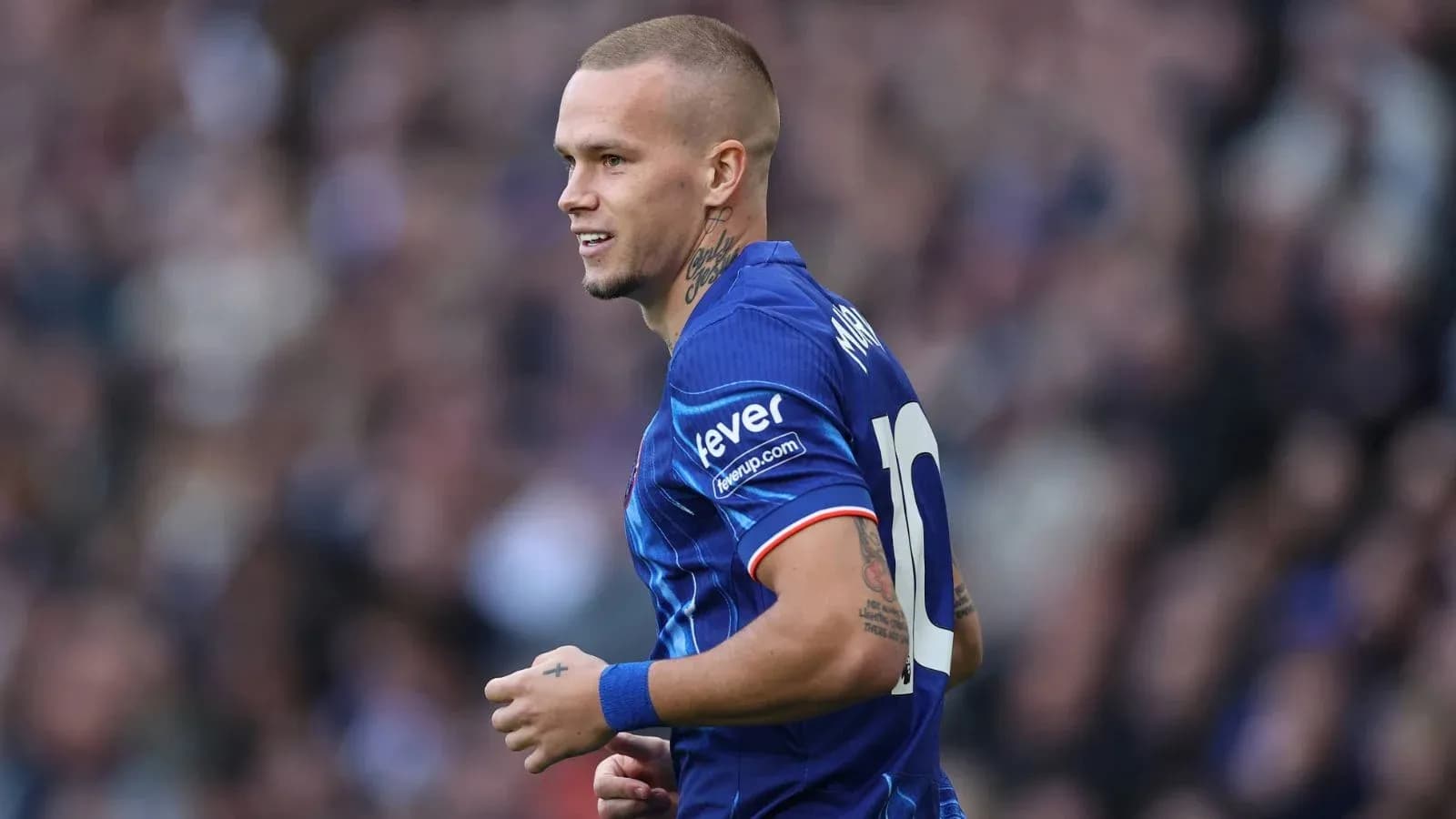 Player wearing blue jersey during match