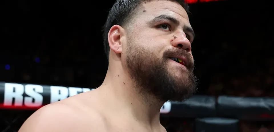 Fighter in the octagon preparing for match