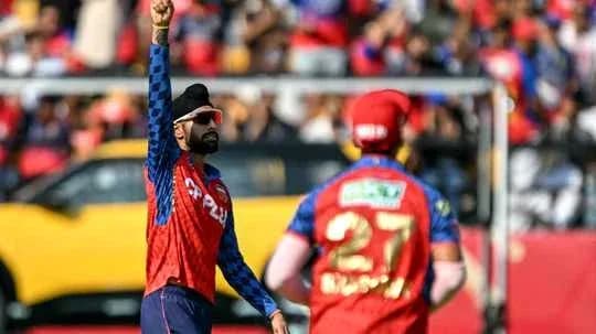 Bowler celebrating wicket during cricket match