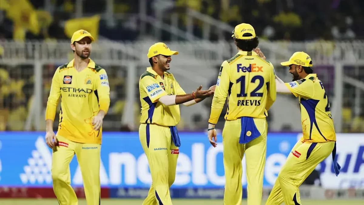 Chennai Super Kings players celebrating on the field