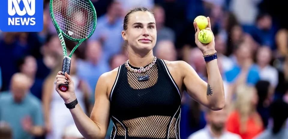 Player holding tennis balls on court after match