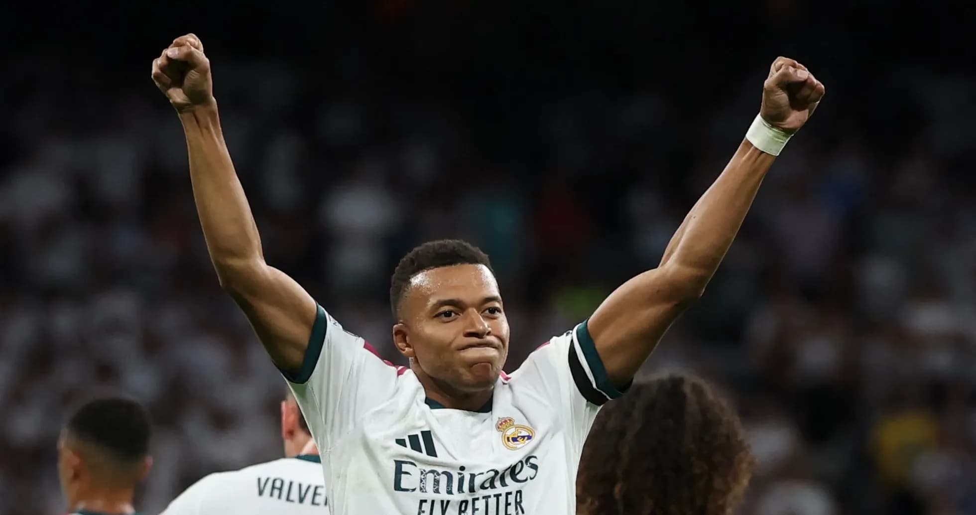 Player celebrating victory with raised fists