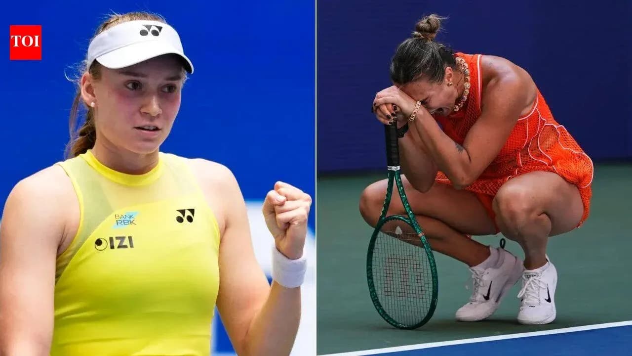 Two tennis players during a match, one celebrating