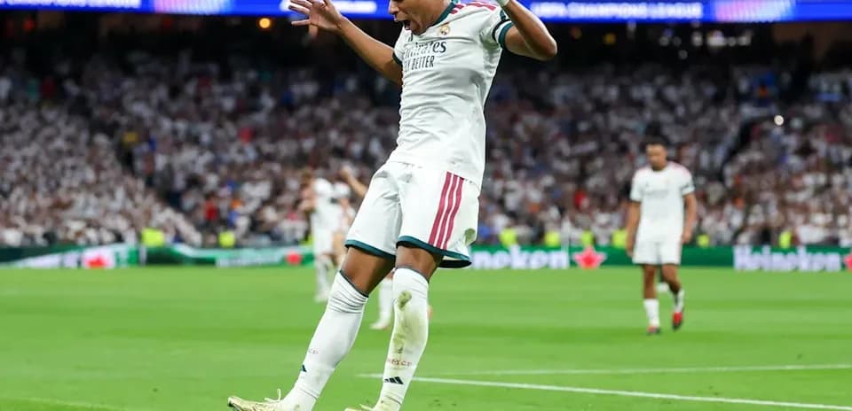 Player celebrating a goal on the field
