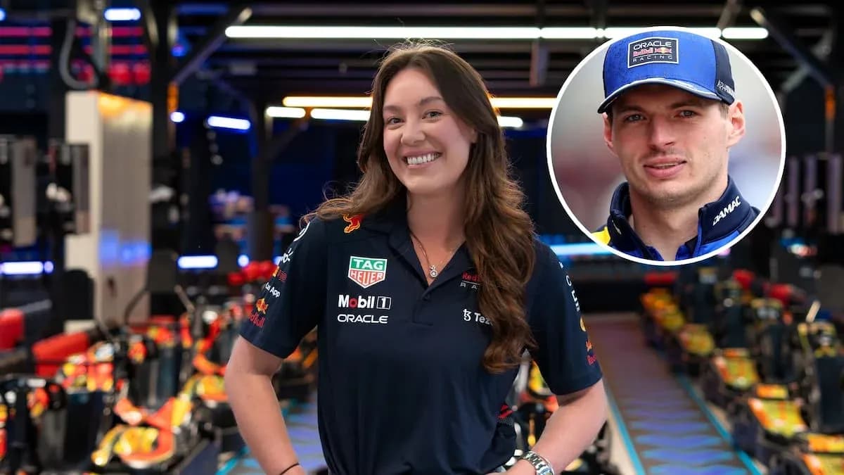 Team member smiling in Red Bull Racing garage
