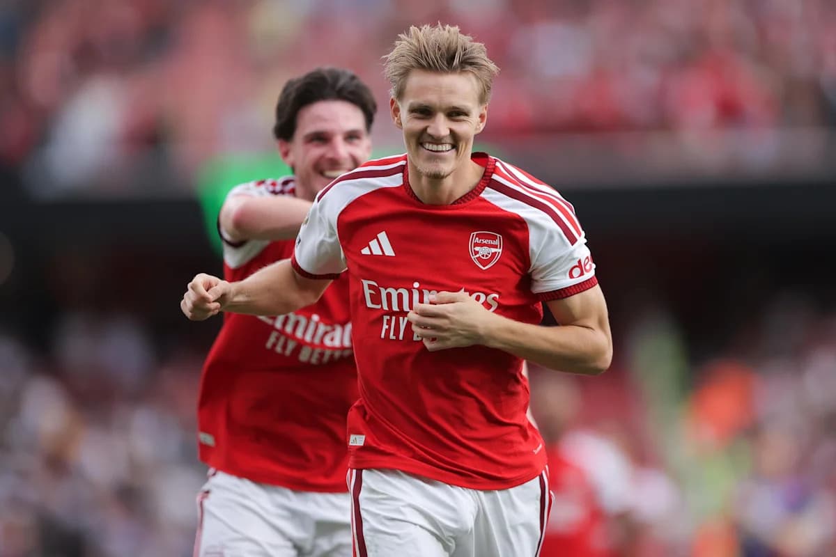 Arsenal players celebrating a goal during match