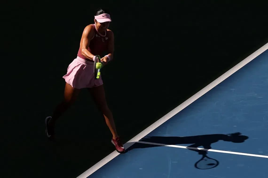 Tennis player hitting a forehand on court