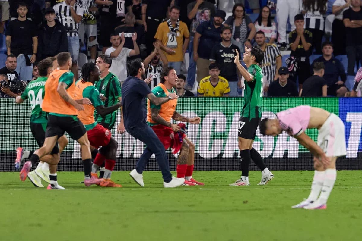 Sassuolo players celebrate after scoring against Juventus