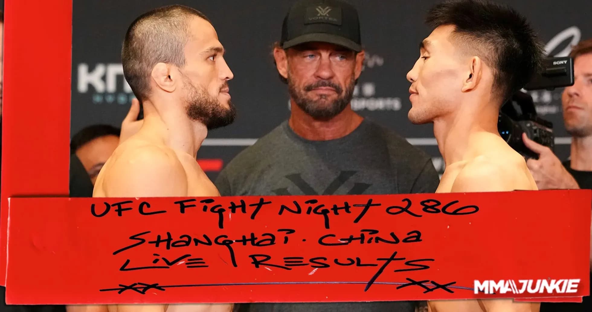 Two fighters facing off at UFC weigh-in event