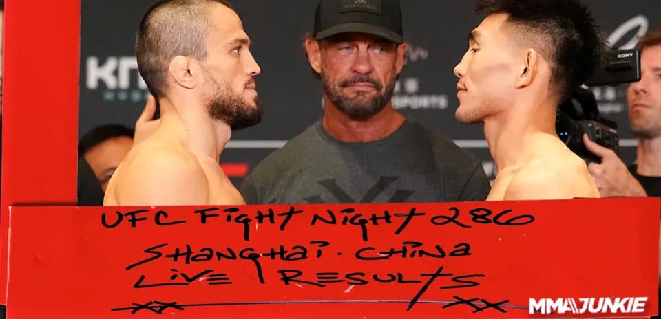 Two fighters facing off at UFC weigh-in event