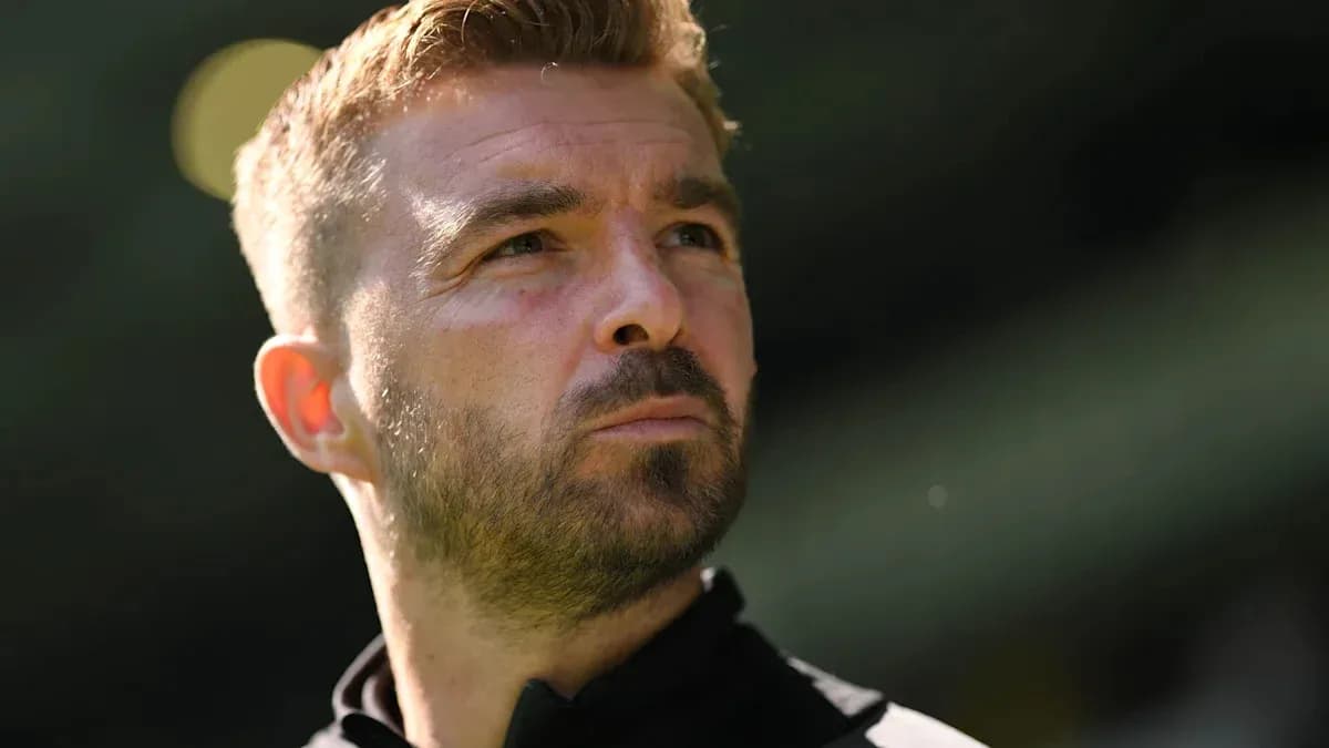 Coach looking thoughtful during training session