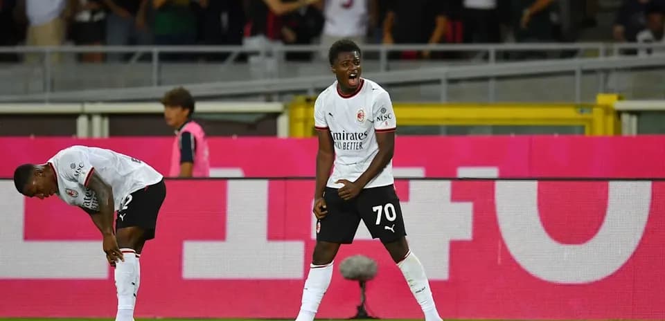 AC Milan player celebrating a goal on the pitch