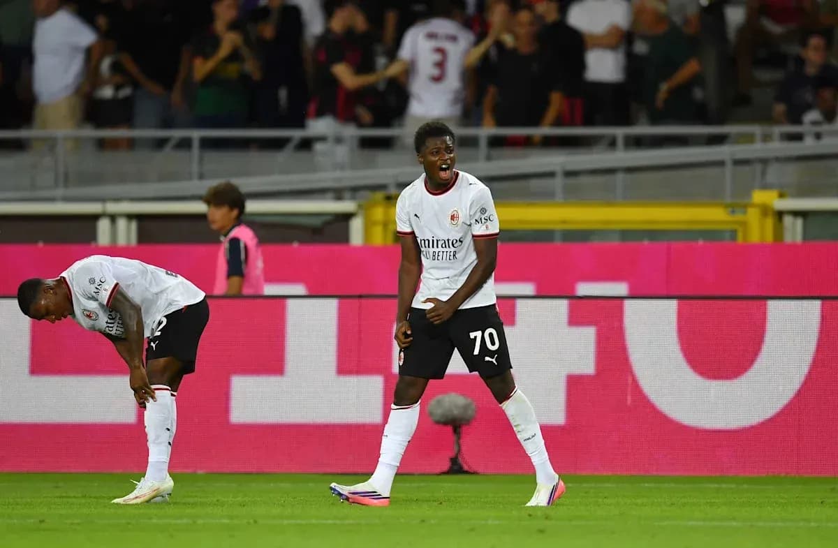 AC Milan player celebrating a goal on the pitch
