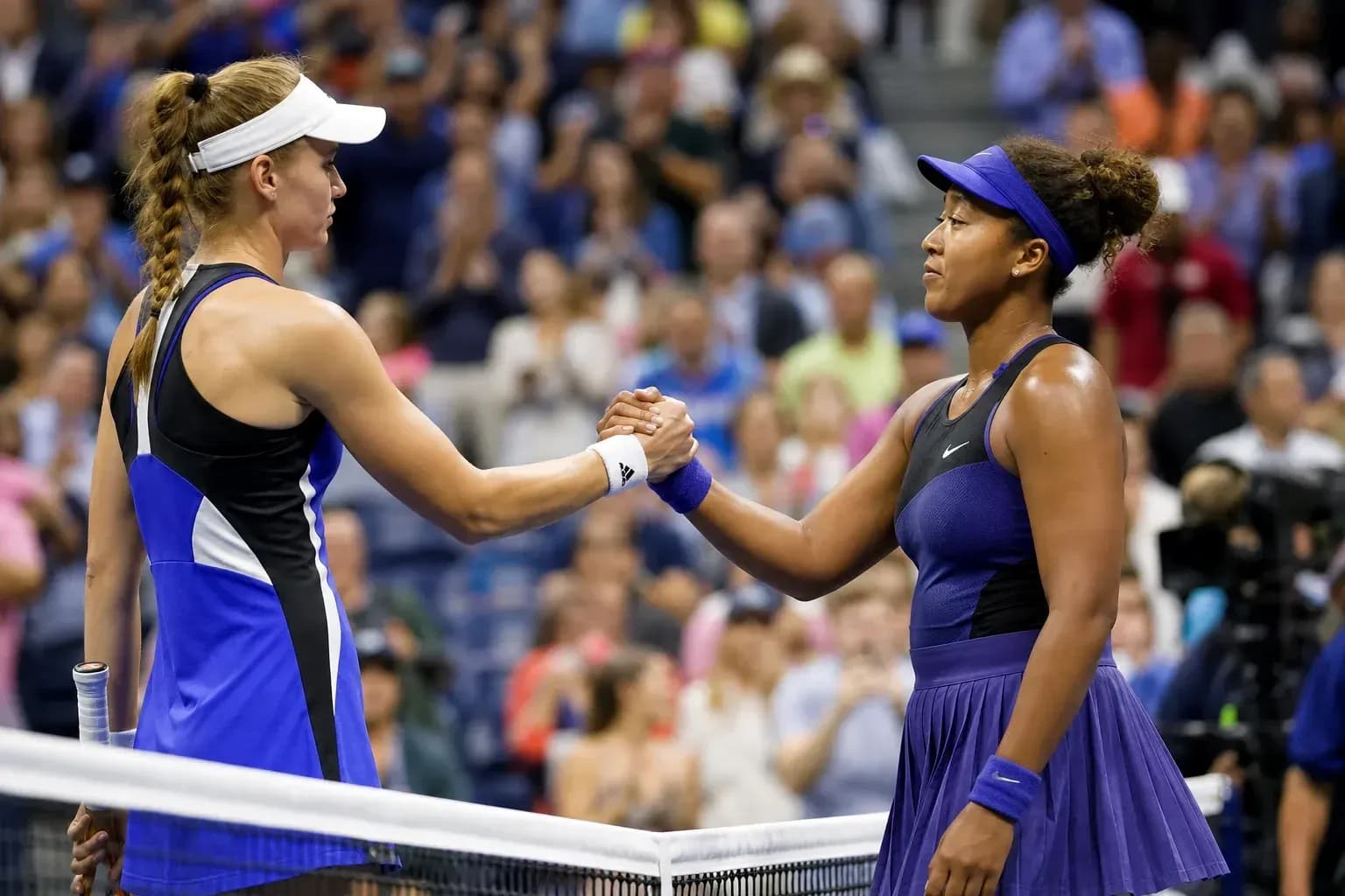 Players shaking hands after a tennis match