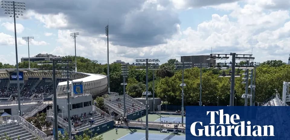 View of tennis courts and stadium on sunny day