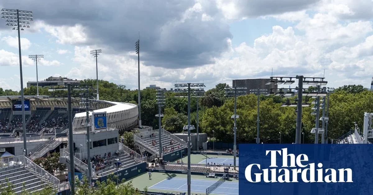 View of tennis courts and stadium on sunny day