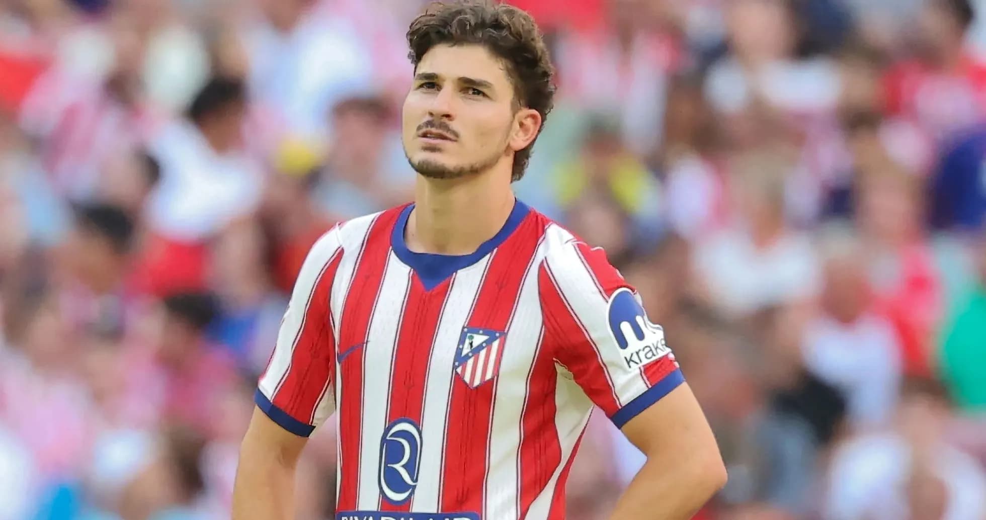 Player in Atlético Madrid jersey during match