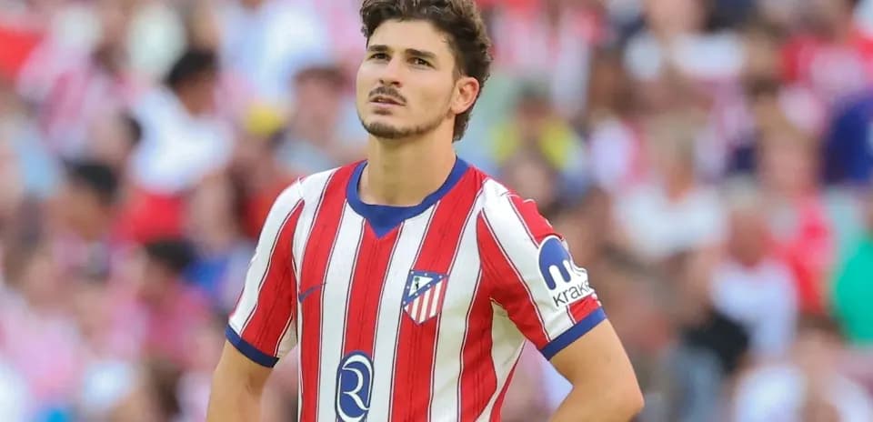 Player in Atlético Madrid jersey during match