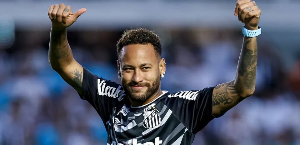 Player celebrating with thumbs up at stadium