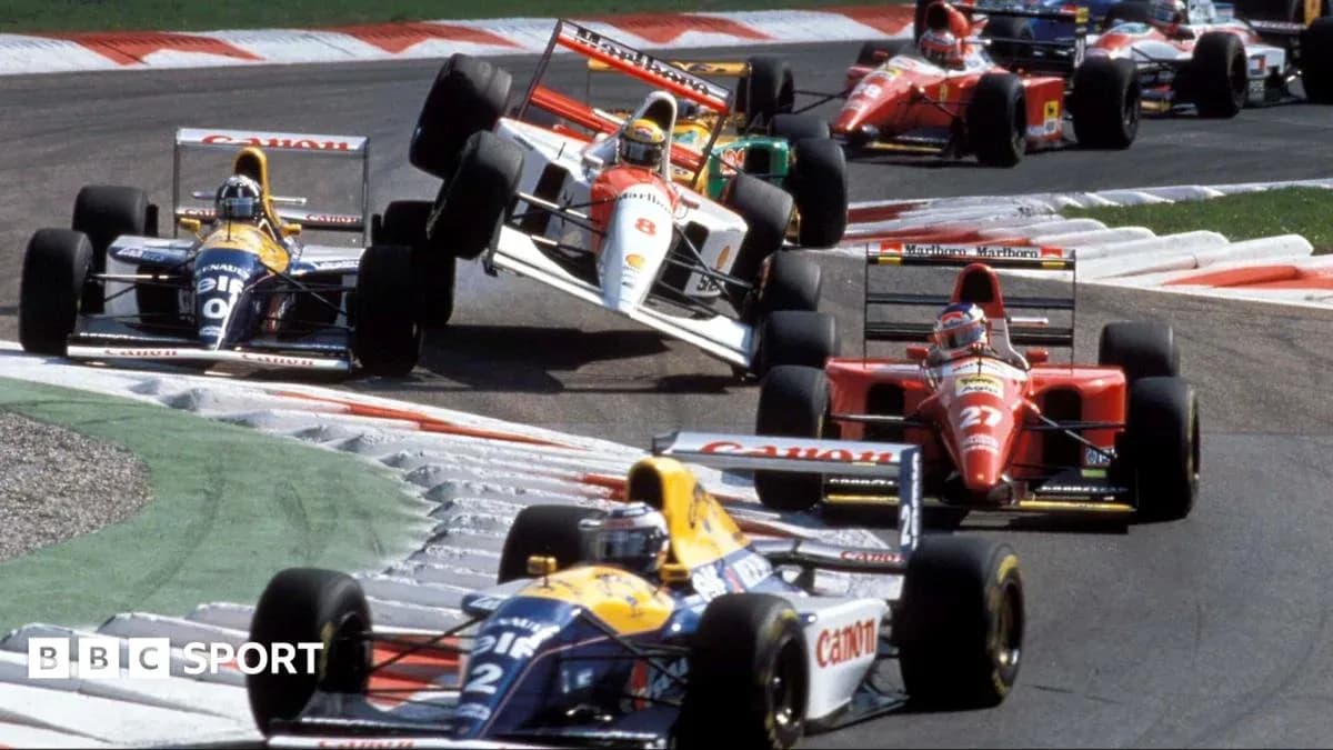 Formula 1 cars racing on a track corner