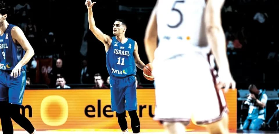 Player 11 from Israel signaling during a game