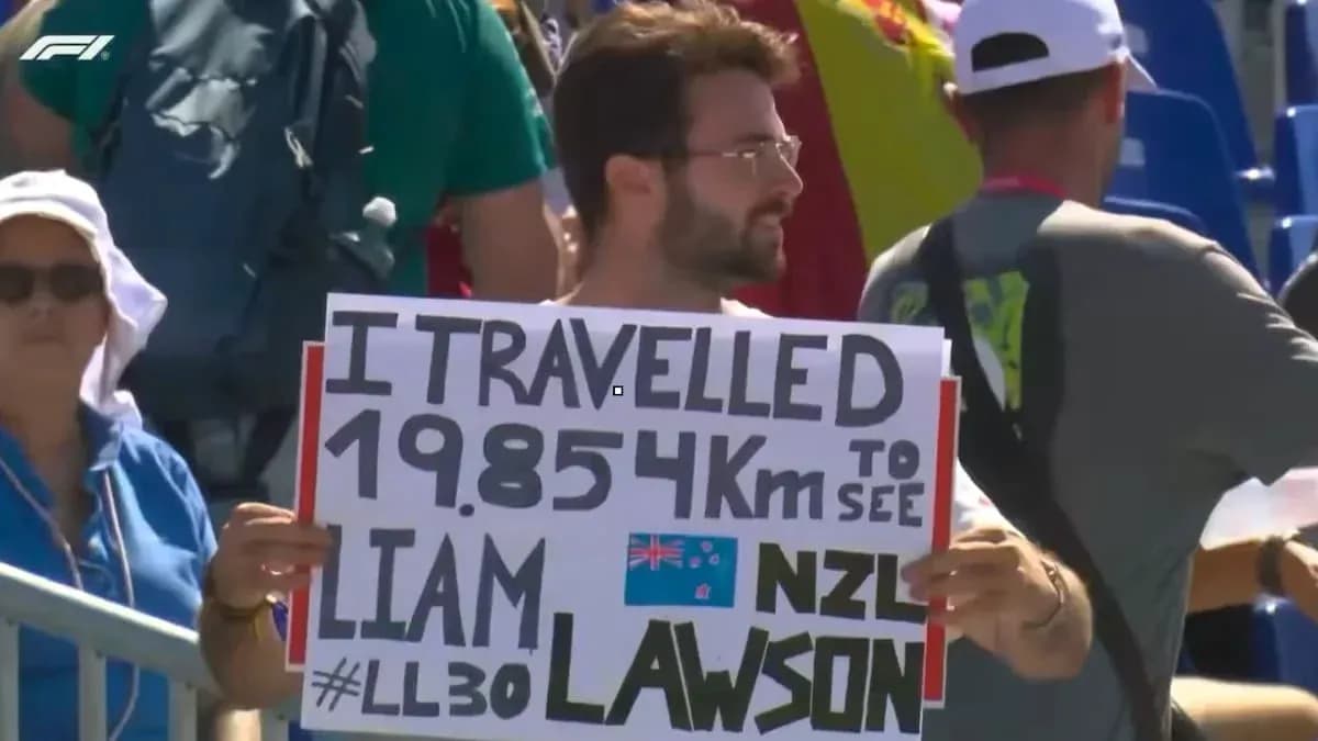 Fan holding sign for Liam Lawson at event