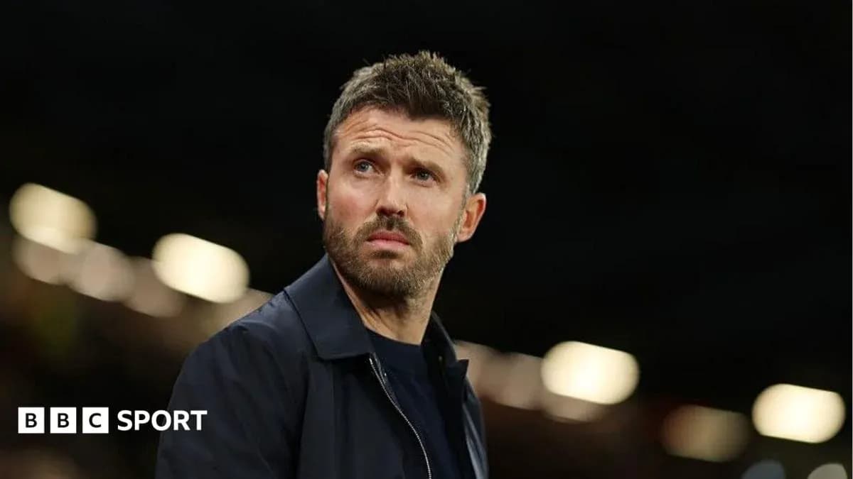 Coach observing match from the sidelines