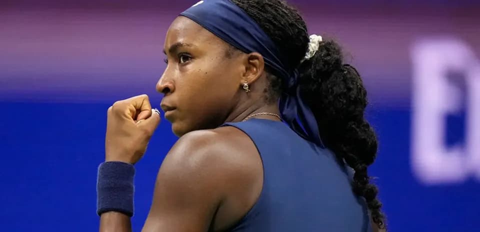 Tennis player celebrating during a match