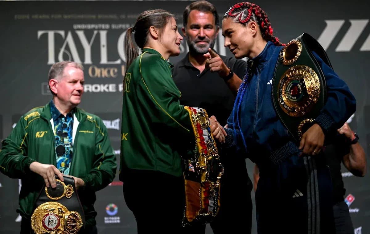 Two boxers shaking hands at press conference