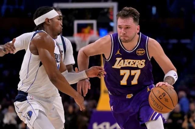 Player dribbling the ball during basketball game