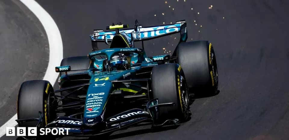 Formula 1 car racing on track with sparks