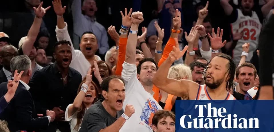 Crowd celebrating during a basketball game