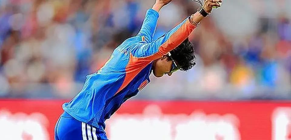 Cricketer celebrating a successful wicket during match