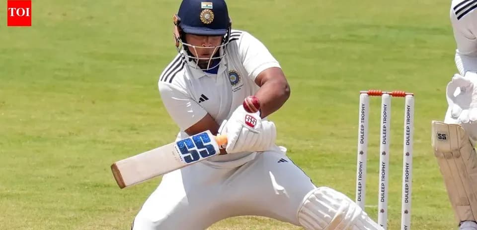 Batsman playing a shot during a cricket match