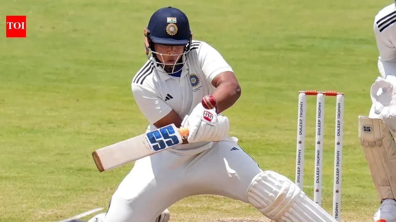 Batsman playing a shot during a cricket match