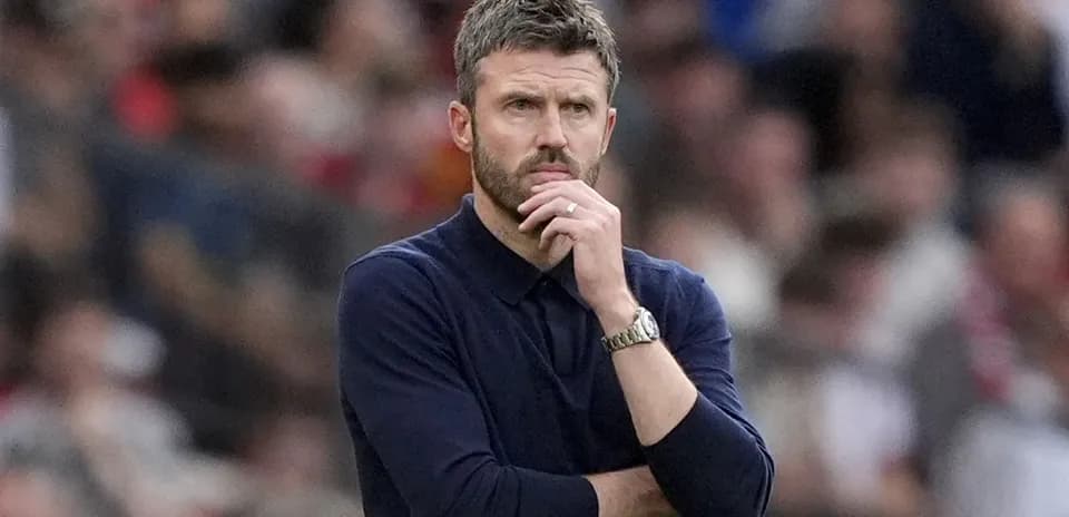 Manager deep in thought during a match