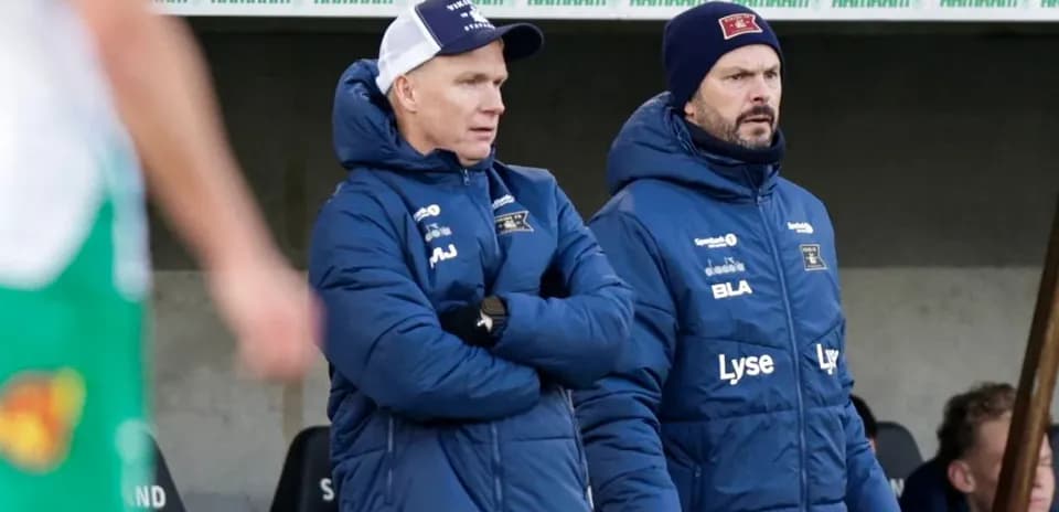 Coaches observing match from the sidelines