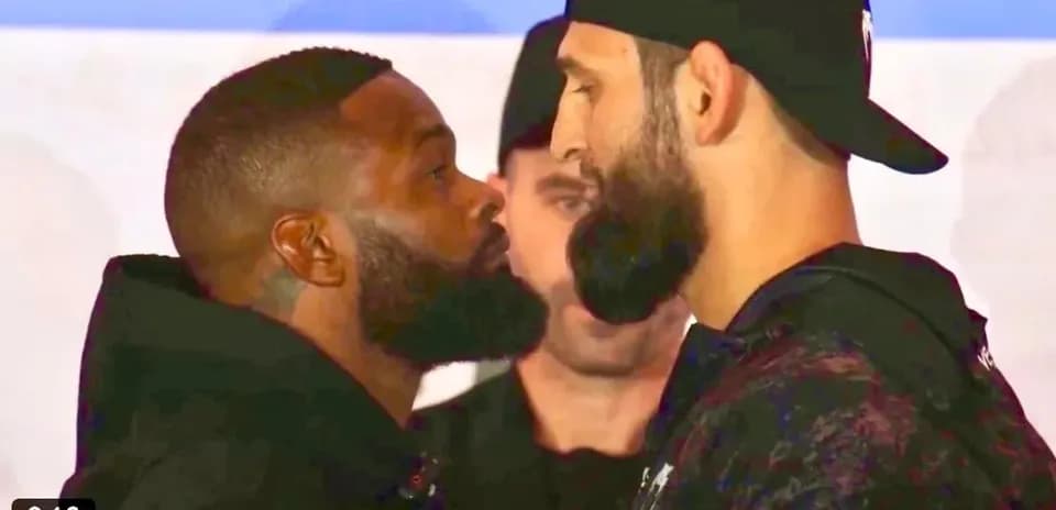 Two fighters facing off at weigh-in event