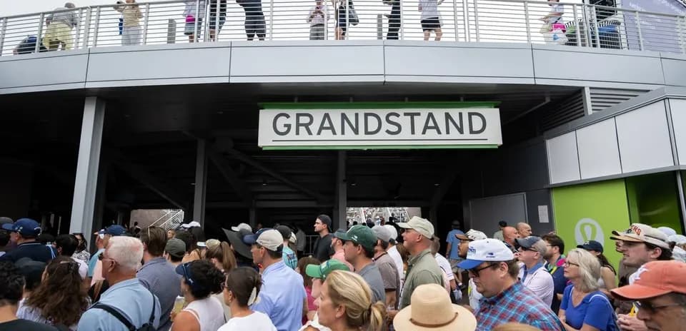 Crowd gathered at entrance to Grandstand area