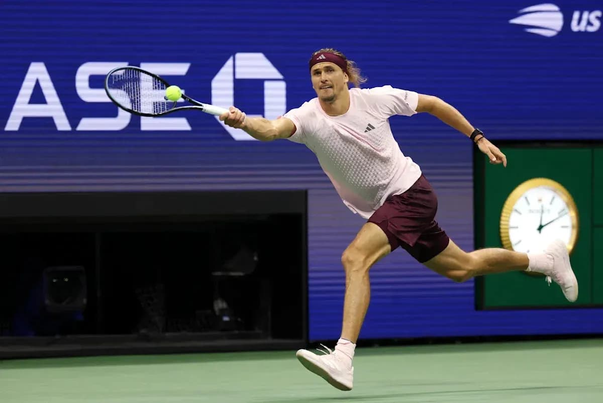 Player reaching for a tennis ball during match