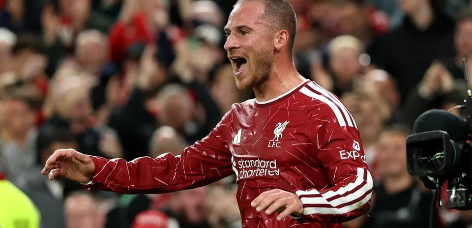 Player celebrating after scoring a goal for Liverpool