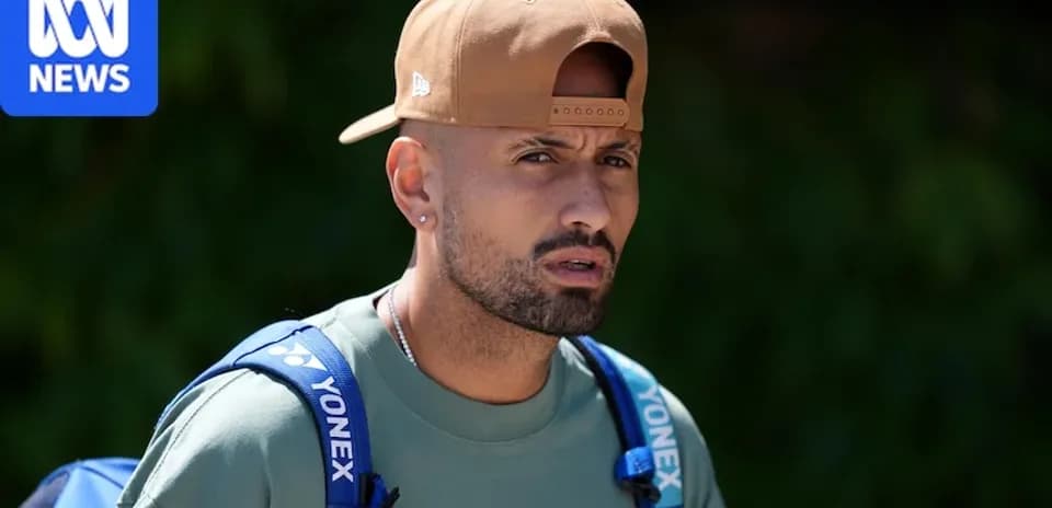 Tennis player walking with backpack and cap