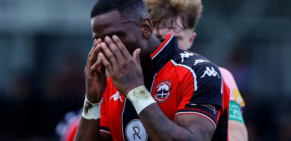 Player with hands on face during match
