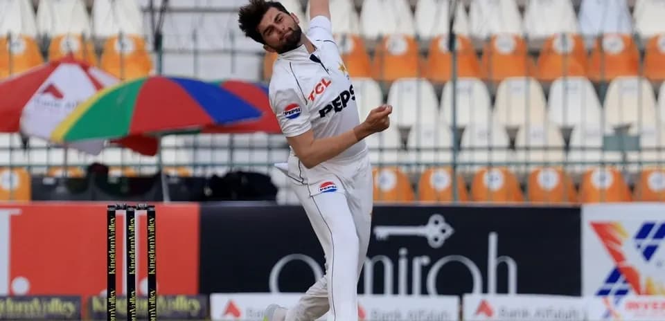 Bowler delivering a ball during cricket match
