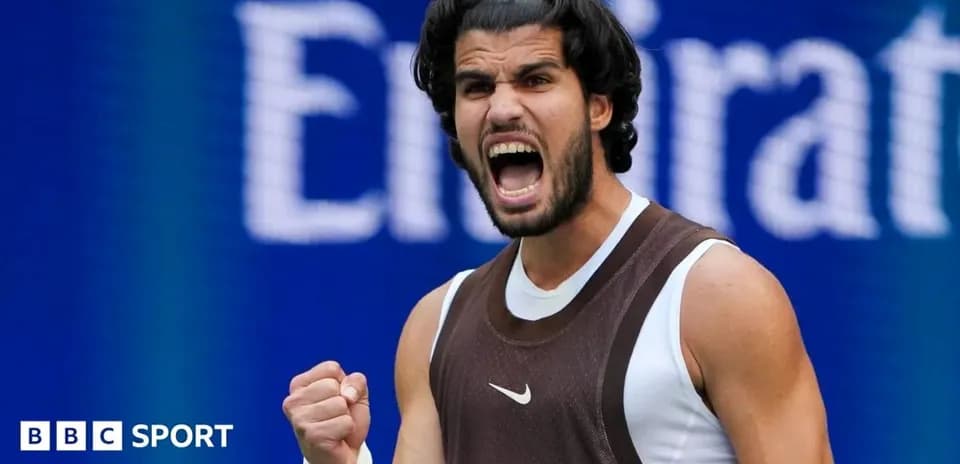 Tennis player celebrating victory with a clenched fist