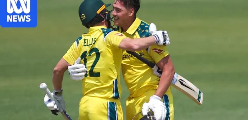 Australian cricket players celebrating a successful run