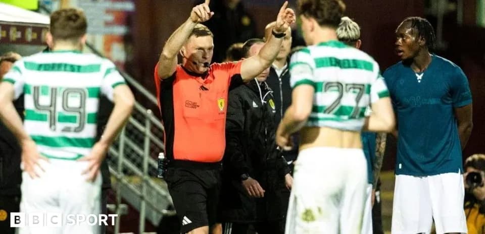 Referee signaling during a tense match situation