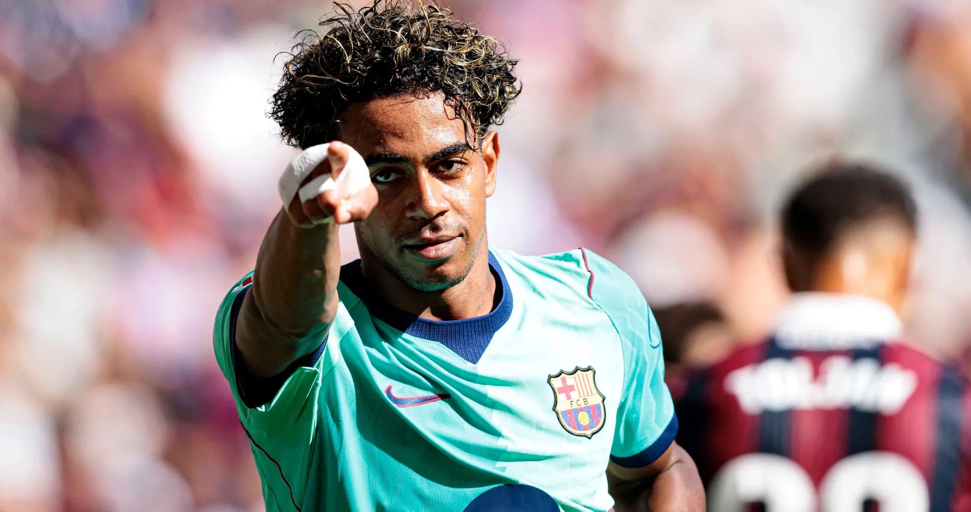 Player celebrating and pointing during match