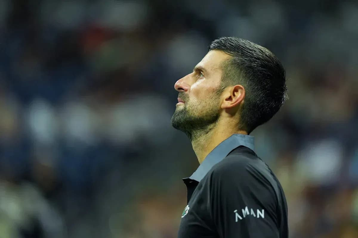 Tennis player looking up during a match