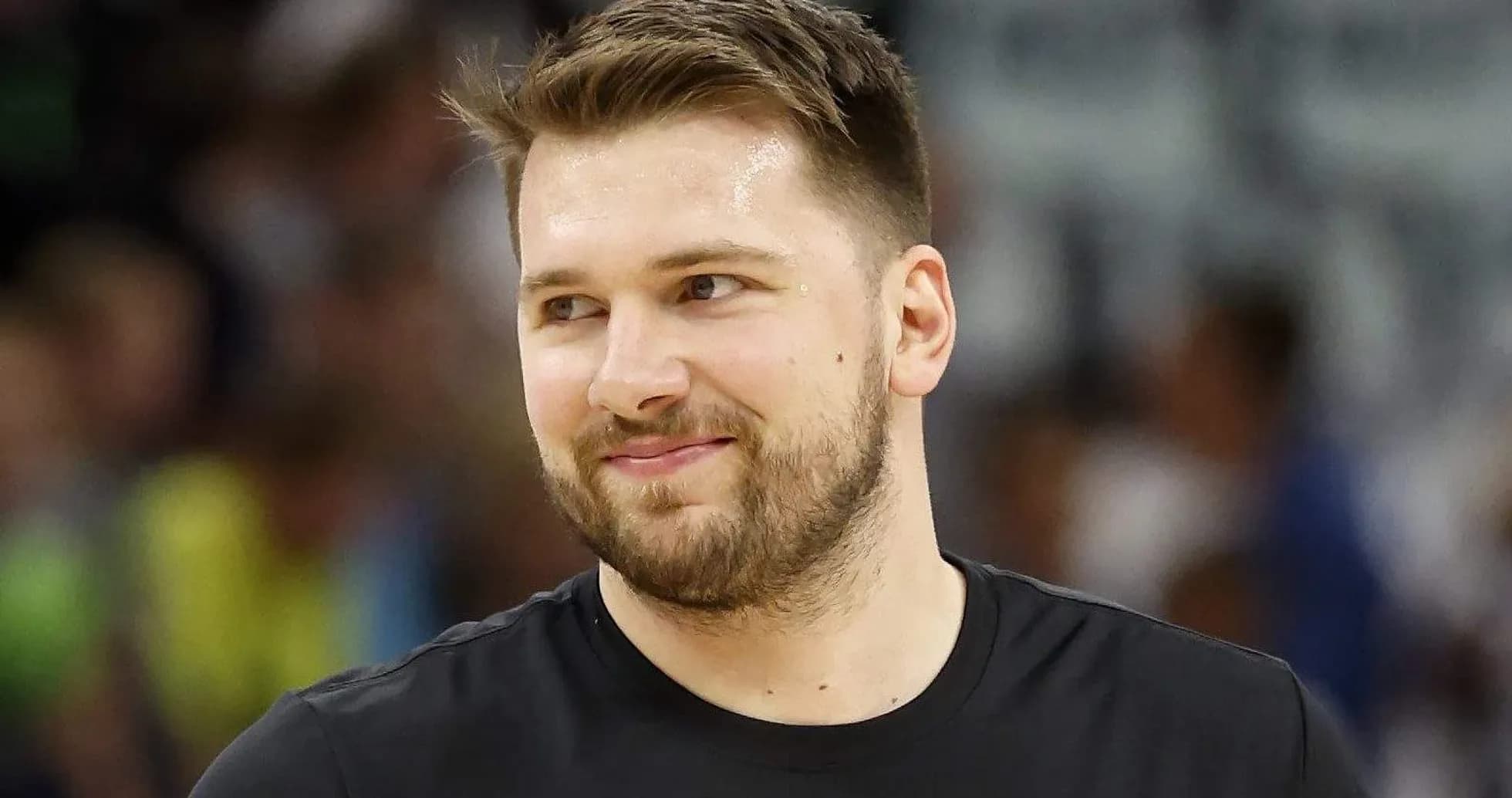 Basketball player smiling during warm-up session